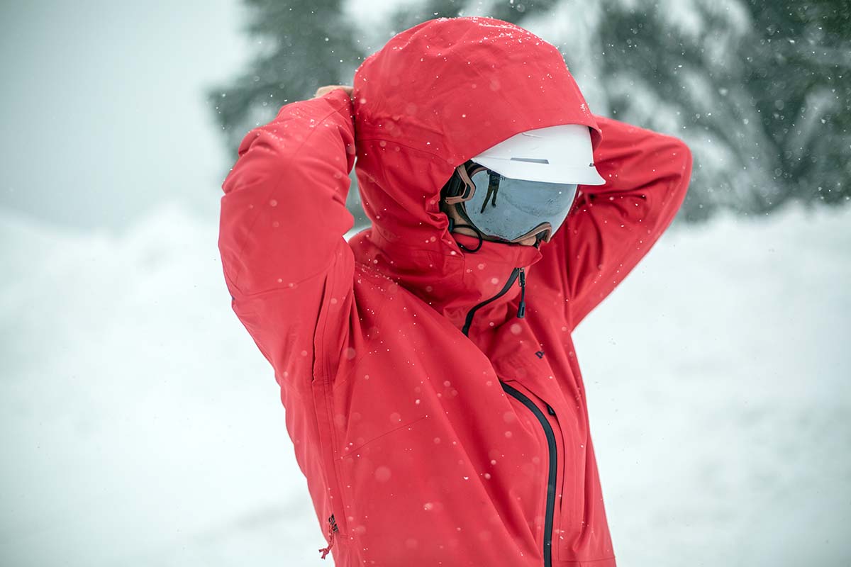 Women's ski jacket (adjusting hood on Patagonia Snowbelle)